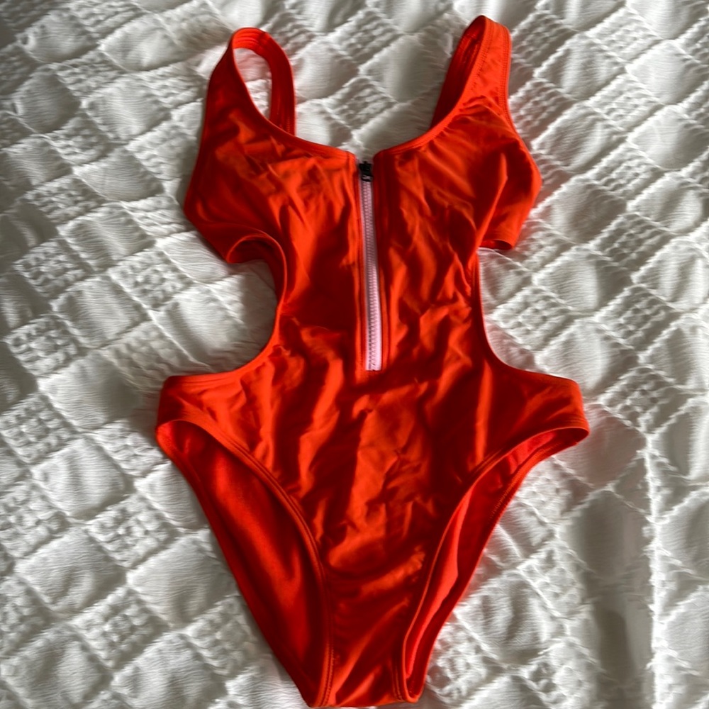 Bathing suit. Worn once padding in bra area